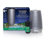 Silberner Sleep Diffuser, Duftfläschchen und Yankee-Candle-Verpackung