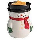 Schneemannförmige Duftlampe mit schwarzer Schale und sichtbaren Wachsstücken