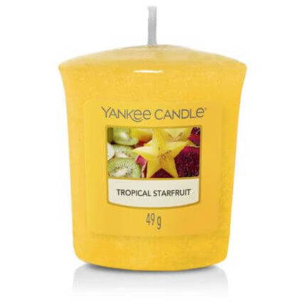 Gelbe Yankee Candle Tropical Starfruit Kerze mit Fruchtmotiv auf dem Etikett