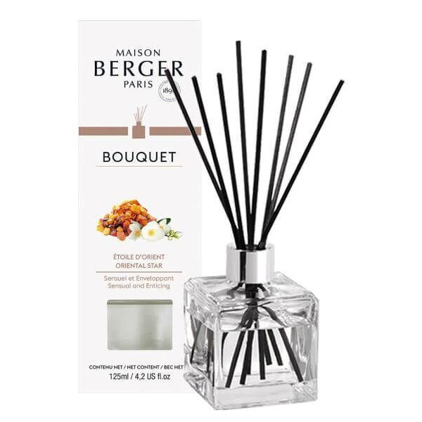 Oriental Star Raumduft-Diffuser Glas-Diffuser mit schwarzen Duftstäbchen neben Maison-Berger-Verpackung