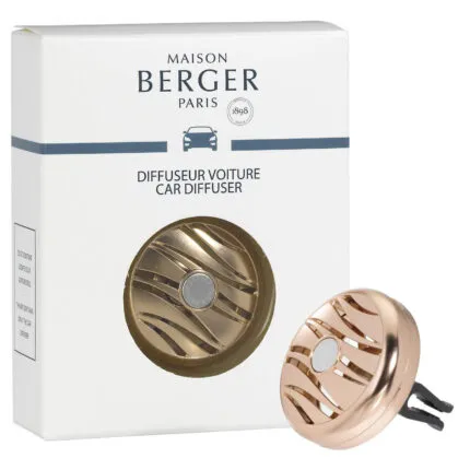 Roségoldener Autoduft-Diffuser liegt vor der Verpackung von Maison Berger Paris