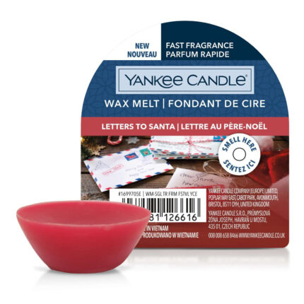 Roter Wax Melt vor der Yankee Candle Letters to Santa Verpackung