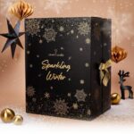 JuwelCandle Sparkling Winter Adventskalender mit goldenen Schneeflocken und Schleife