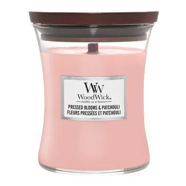 Rosa WoodWick Kerze im Glas mit sichtbarem Produktetikett