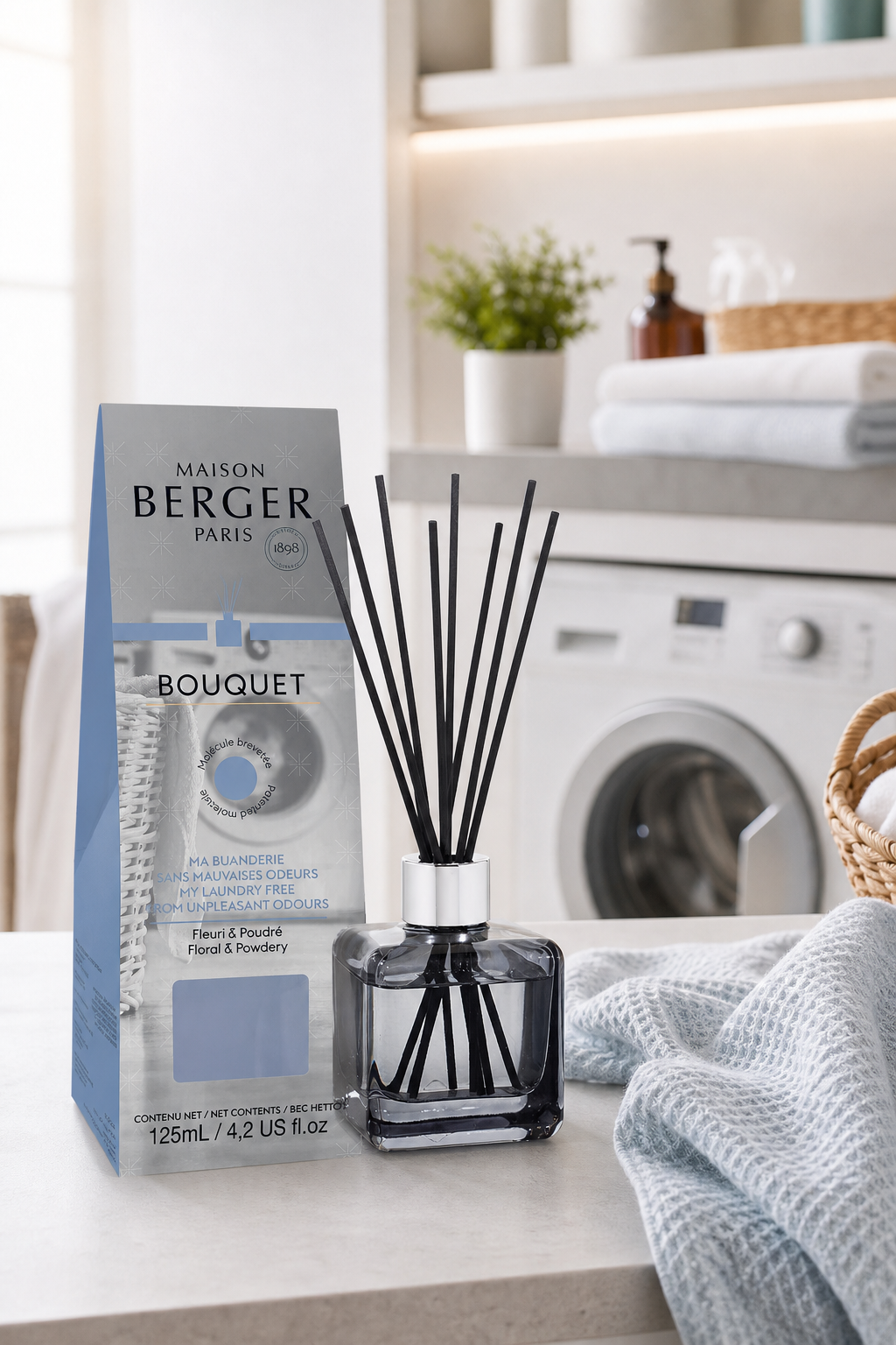 Maison Berger Raumduft-Diffuser mit Verpackung auf einer Waschküchenablage