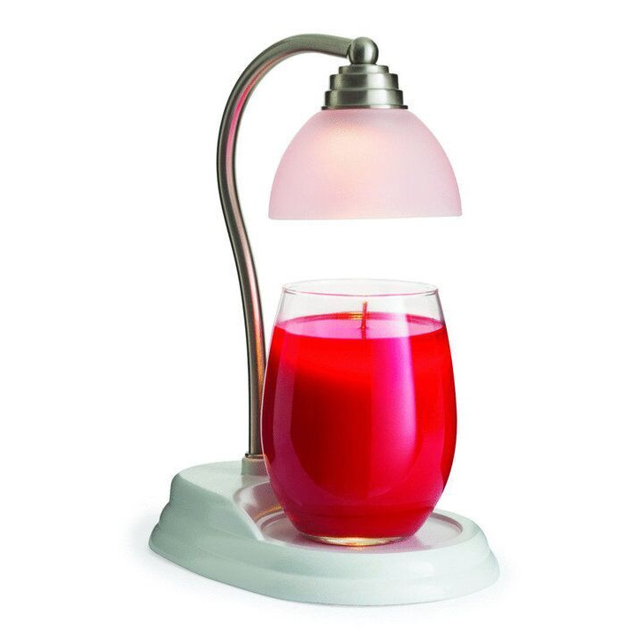 Kerzenwärmer mit rotem Glas Kerzenwärmer mit rotem Glas und sichtbarer Flamme unter Lampenschirm