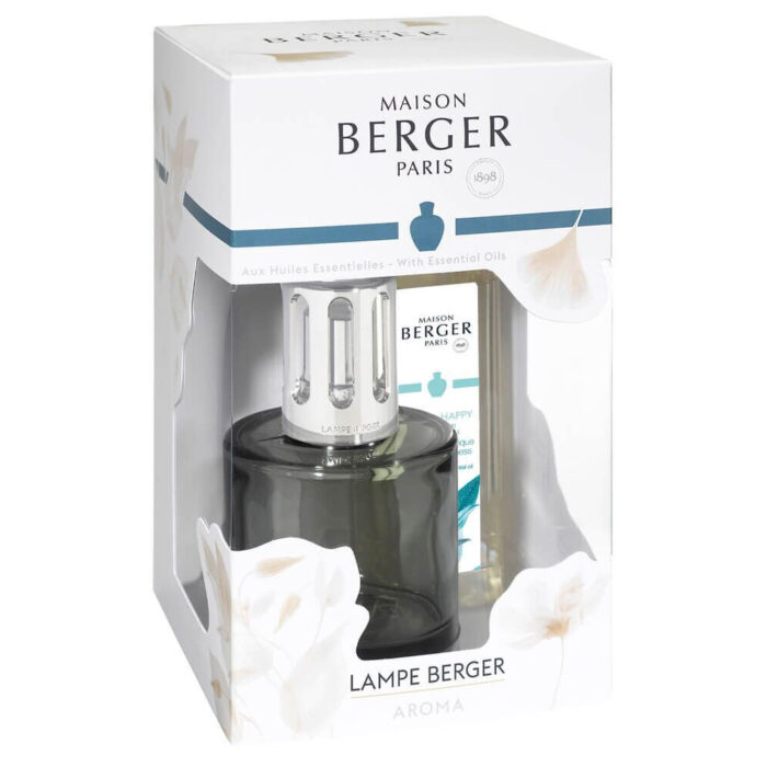 Maison Berger Aroma Happy Lampenset mit Verpackung auf einem Wohnzimmertisch
