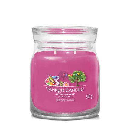 Pinke Yankee-Candle-Kerze im Glas mit sichtbarem Art-in-the-Park-Etikett