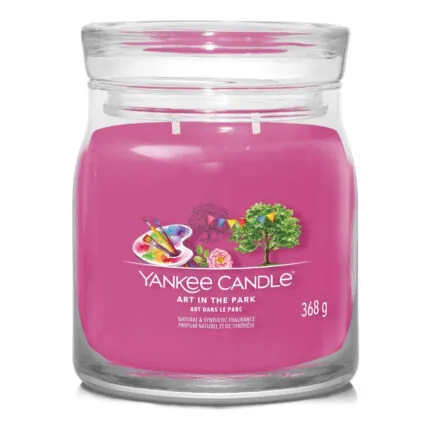 Pinke Yankee-Candle-Kerze im Glas mit sichtbarem Art-in-the-Park-Etikett