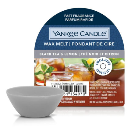 Grauer Yankee Candle Wachsmelt vor der Verpackung Black Tea & Lemon