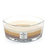 Geöffnete WoodWick Trilogy Kerze im Glas mit sichtbarem Docht