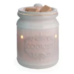 Weiße Cookie Jar Duftlampe mit Wachsstücken und leuchtenden Öffnungen