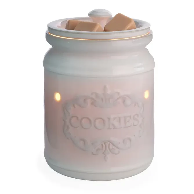 Weiße Cookie Jar Duftlampe Weiße Cookie Jar Duftlampe mit sichtbaren Wachsstücken und leuchtenden Öffnungen