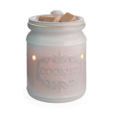 Weiße Cookie Jar Duftlampe mit Wachsstücken und leuchtenden Öffnungen
