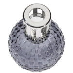 Graue Lampe Berger neben einer Flasche Amber-Powder-Parfum