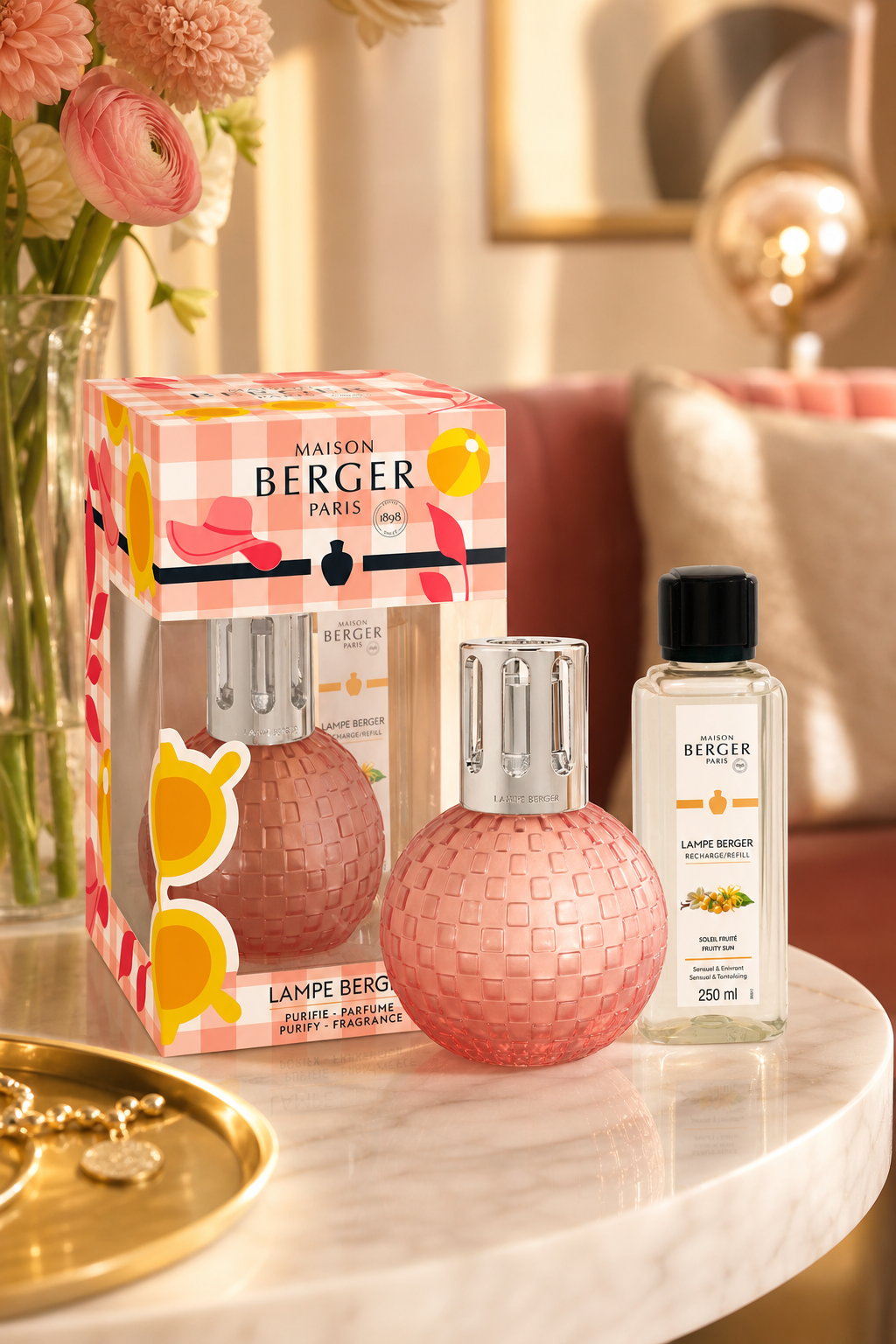 Lampe-Berger-Set mit Verpackung und Nachfüllflasche auf einem Tisch