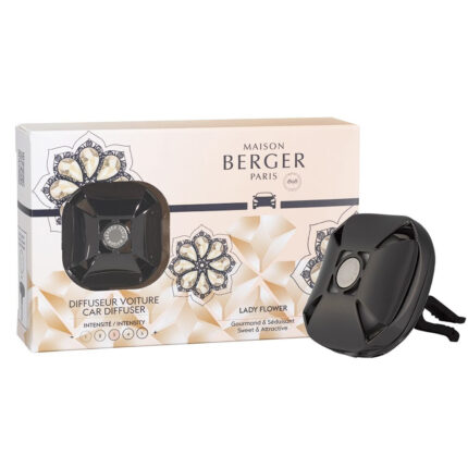 Schwarzer Autoduft-Diffuser neben Verpackung von Maison Berger Paris