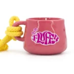 Pinke Kerzentasse mit gelber Kordel und sichtbarem Fluffy-Schriftzug