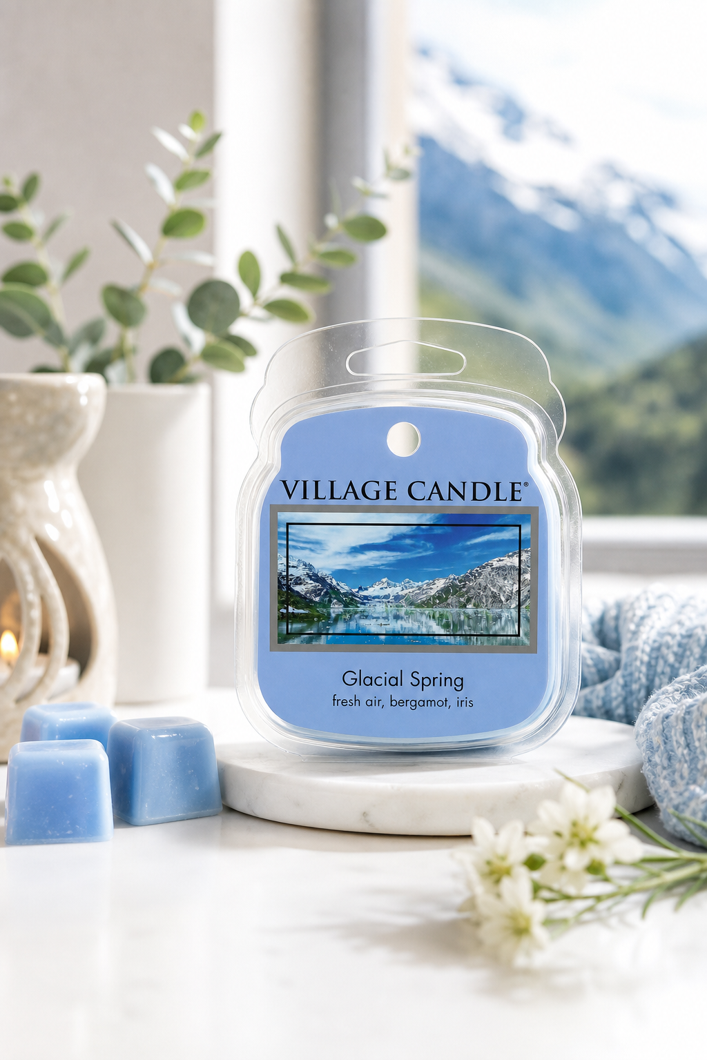 Glacial Spring Duftwachs auf einer Ablage neben Fenster und Pflanze