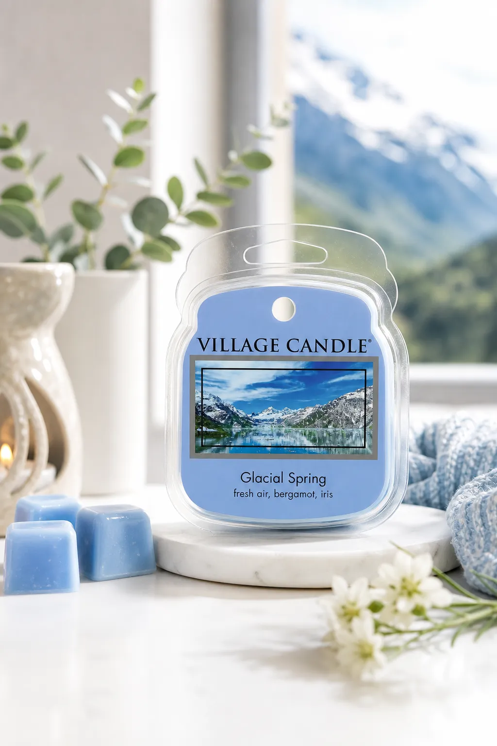Glacial Spring Duftwachs auf einer Ablage neben Fenster und Pflanze