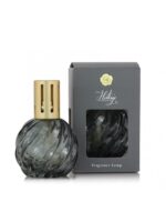 Graue Heritage Duftlampe neben Verpackung mit sichtbarem Produkt und Aufdruck
