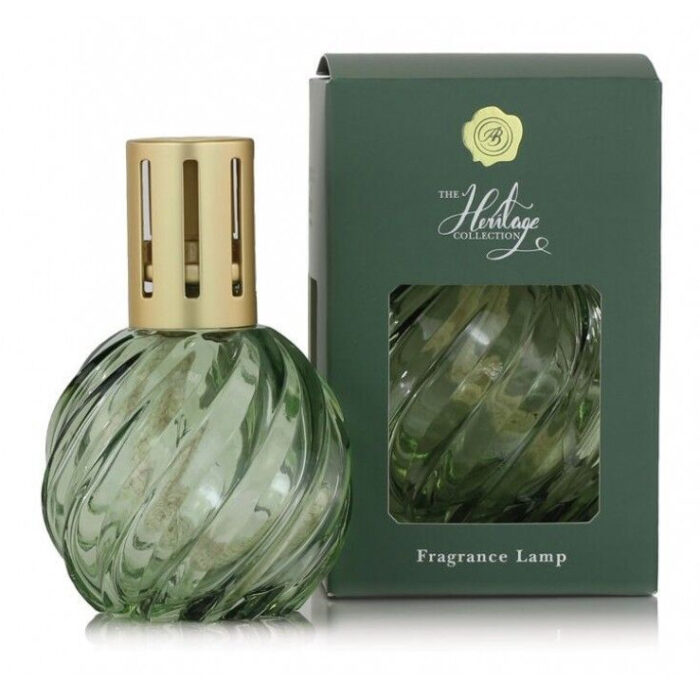 Grüne Duftlampe neben grüner Verpackung der Heritage Collection