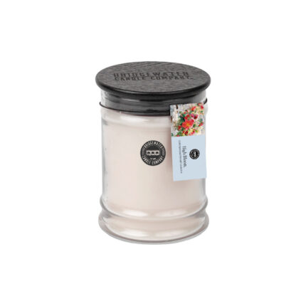 High Bloom Kerze im Glas mit dunklem Deckel und floralem Etikett