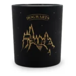 Schwarze Kerze mit goldenem Hogwarts-Schloss und Sternenmotiv