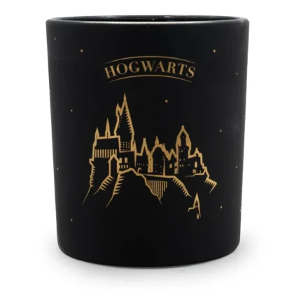 Schwarze Kerze mit goldenem Hogwarts-Schloss und Sternenmotiv