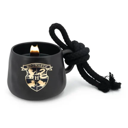Schwarze Hogwarts Tassenkerze mit brennender Flamme und Seilgriff