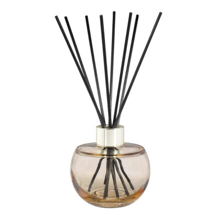 Nahaufnahme des runden Diffusers mit schwarzen Duftstäbchen und Metallverschluss
