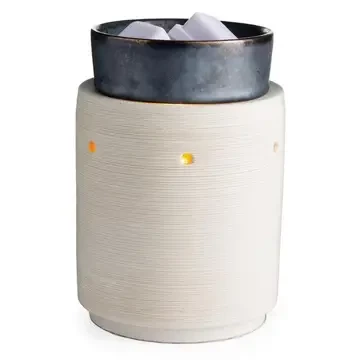 Elektrische Duftlampe mit dunkler Schale und drei leuchtenden Öffnungen