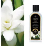 Ashleigh & Burwood Duftöllasche mit Jasmin-und-Tuberose-Etikett vor Blütenmotiv