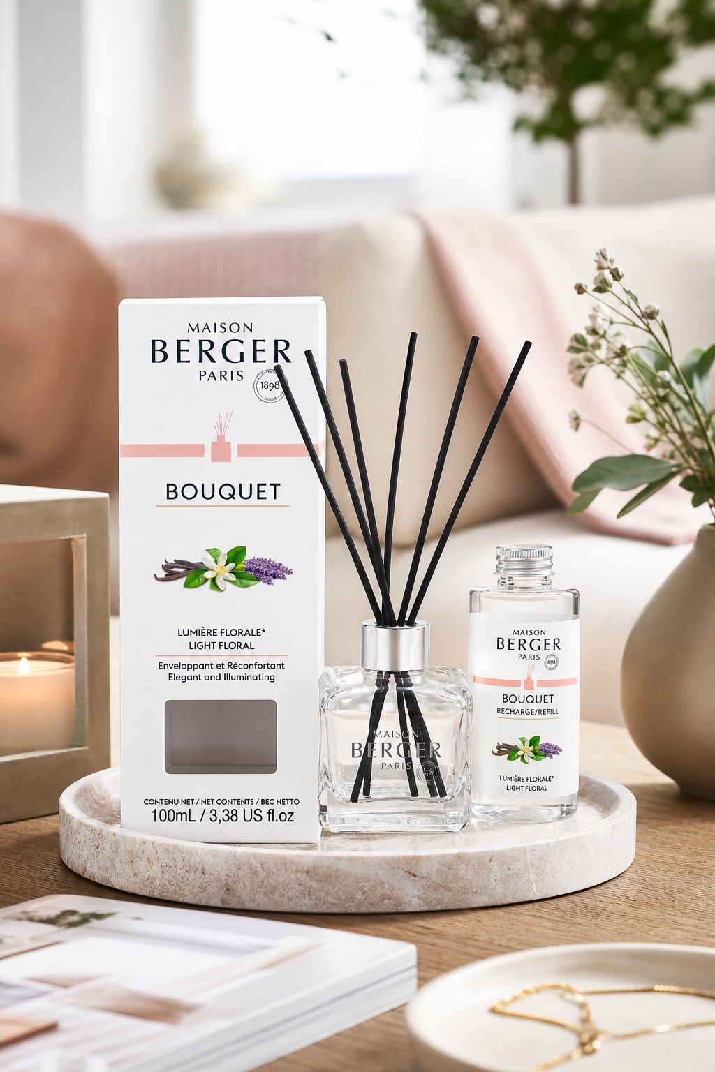 Maison Berger Diffuser mit Verpackung und Nachfüllflasche auf einem Wohnzimmertisch