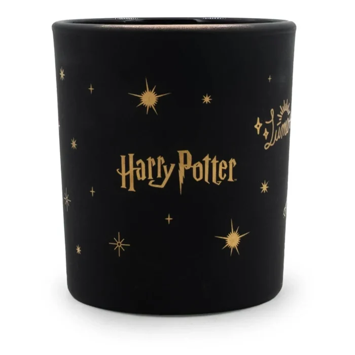 Schwarze Harry-Potter-Duftkerze mit goldener Schrift und Sternmotiven