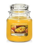 Gelbe Yankee Candle Mango Peach Salsa Duftkerze im Glas