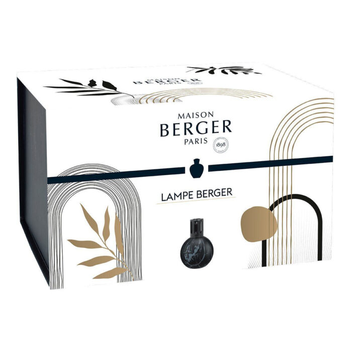 Schwarze marmorierte Lampe Berger auf einem Tisch neben Pflanzen und Buch