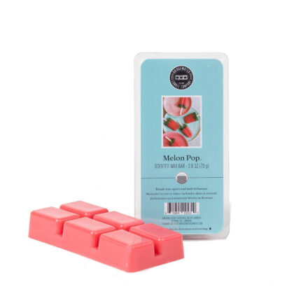 Rosafarbene Wachsstücke vor der Verpackung des Melon Pop Wax Bars