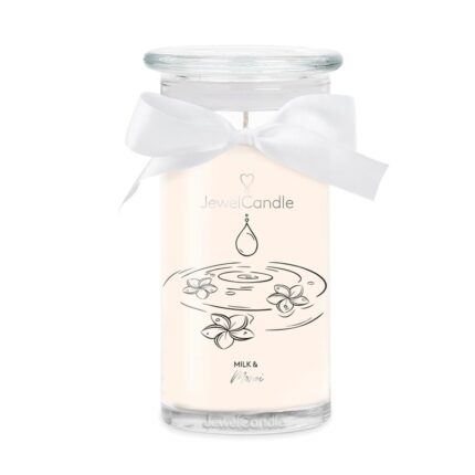Milk & Monoi Kerze im Glas mit Blumenmotiv und weißer Schleife