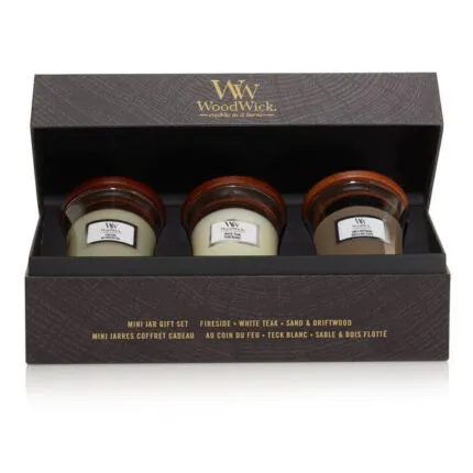 Geöffnetes Geschenkset mit drei WoodWick Mini-Jar-Kerzen