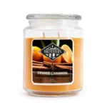 Orange Cinnamon Kerze im Glas mit sichtbarem Markenetikett und zwei Dochten