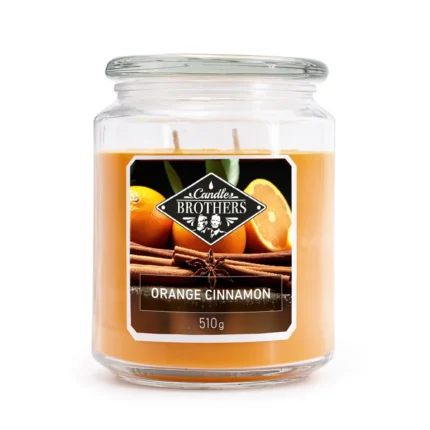 Orange Cinnamon Kerze im Glas mit sichtbarem Markenetikett und zwei Dochten