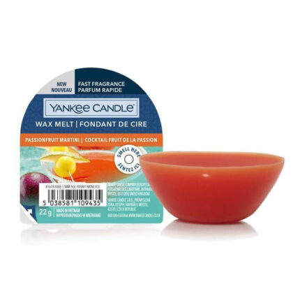 Yankee Candle Passionfruit Martini Wachsmelt neben roter Schale
