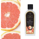 Flasche Lamp Fragrance Pink Grapefruit von Ashleigh & Burwood vor Grapefruithälften