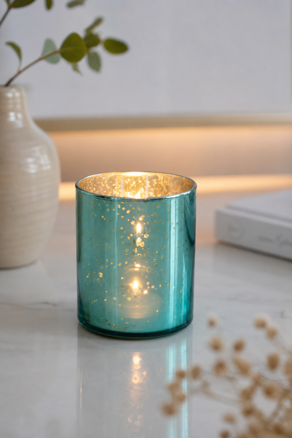 Rapsody Windlicht 9cm neon aqua in einer stimmungsvollen Anwendungsszene