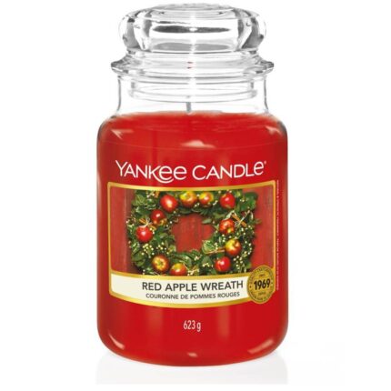 Rote Yankee Candle im Glas mit transparentem Deckel und Apfelkranz-Etikett