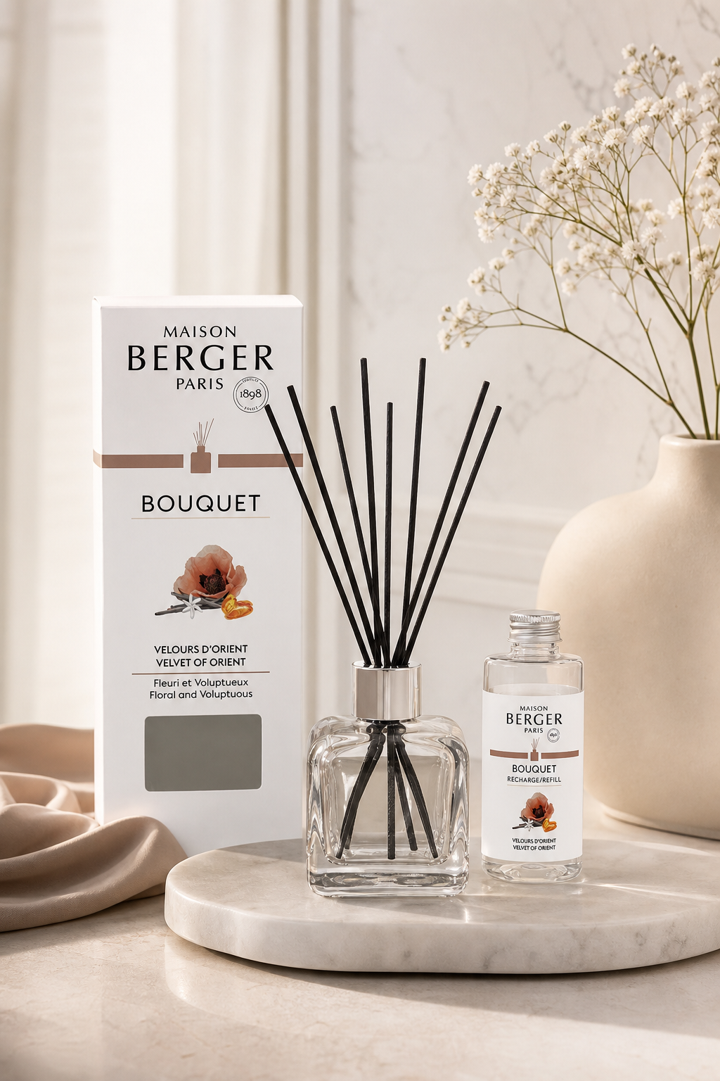 Maison Berger Raumduft-Diffuser mit Verpackung und Nachfüllflasche auf einem Tisch