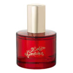 Rote Sweet Raumsprayflasche auf weißem Hintergrund