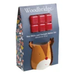 Verpackter Reindeer-Teelichtschmelzer mit sechs roten Wachsmelts