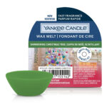 Grünes Wax Melt vor geöffneter Yankee Candle Verpackung
